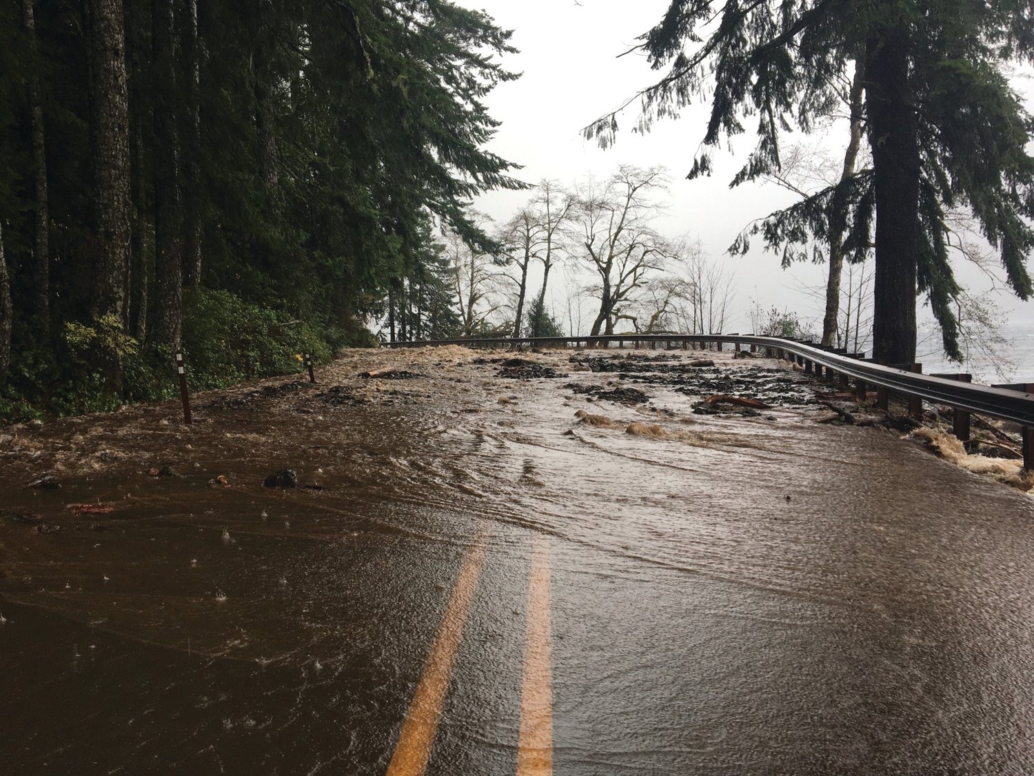 US Highway 101 around Lake Crescent was just one of many road closures in Olympic National Park after Monday’s storm caused massive flooding in the region.